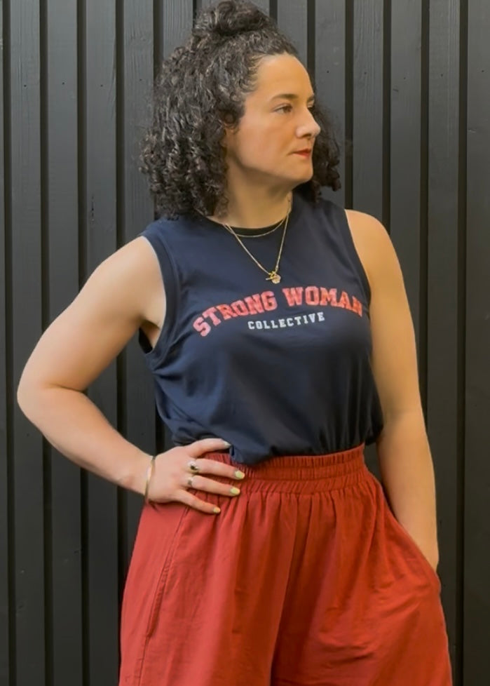Limited edition navy vest with gingham logo